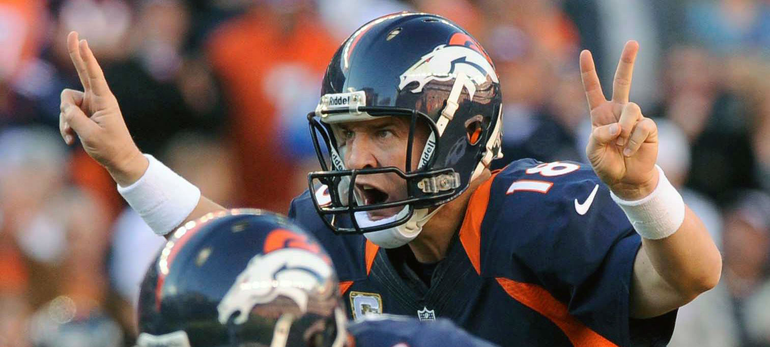 Broncos quarterback Peyton Manning calls out a play during the 2013-14 season at Mile High Stadium. (The Gazette/Jerilee Bennett)